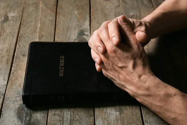 Man Holy Bible Dark Wooden Table Closeup — Stock Photo, Image