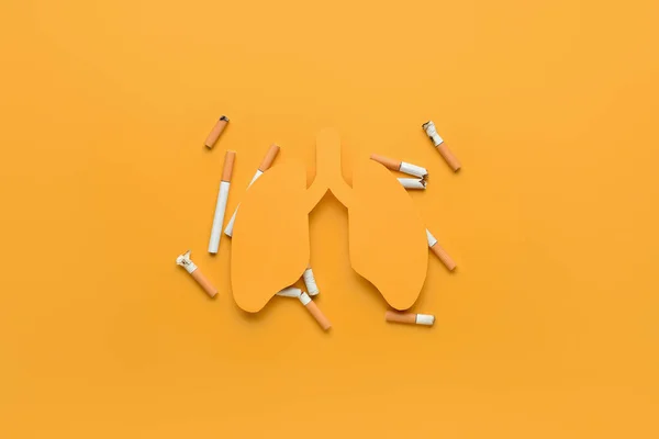 Papper Lungor Med Cigaretter Orange Bakgrund — Stockfoto