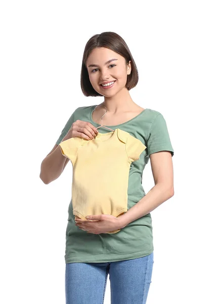 Beyaz Arka Planda Bebek Tulumu Giyen Hamile Bir Kadın — Stok fotoğraf