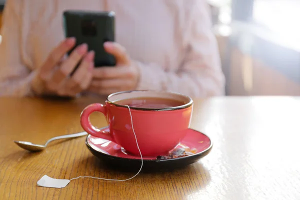 Cup Hot Tea Table Cafe Woman Background — Stock Photo, Image