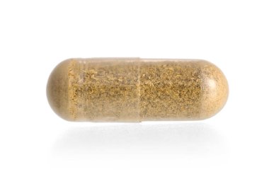 Beyaz arkaplanda K vitamini kapsülü