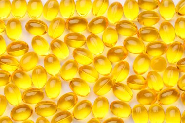 Arkaplan olarak A vitamini kapsülleri, yakın plan