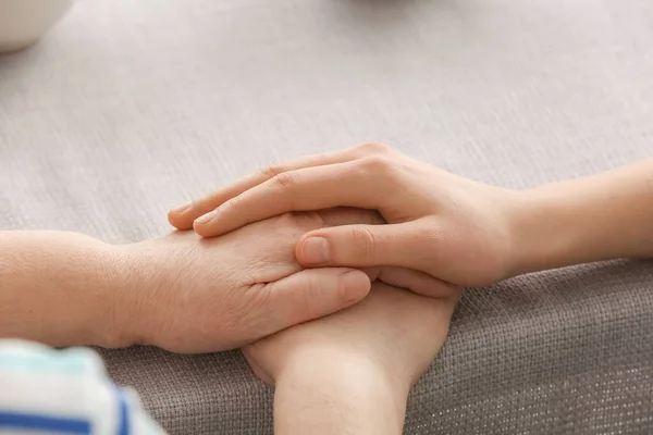 Young Woman Holding Hands Grandmother Table — Stock Photo, Image