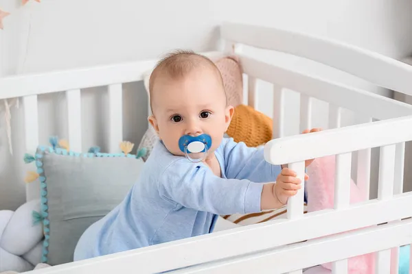 Cute Little Baby Boy Nibbler Crib — Stock Photo, Image
