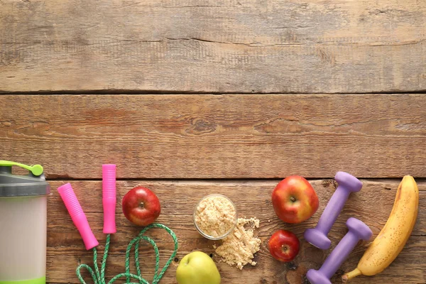 Bowl Protein Powder Apples Banana Skipping Rope Dumbbells Bottle Wooden — Stock Photo, Image