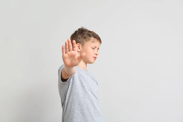 Little Boy Showing Stop Gesture Light Background — Stock Photo, Image