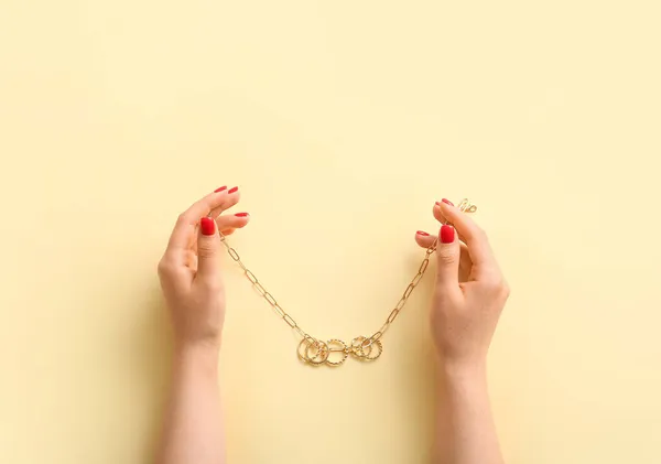 Woman Beautiful Manicure Holding Necklace Color Background — Stock Photo, Image