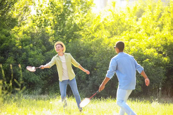 Young Men Playing Badminton Outdoors — Stock Photo, Image