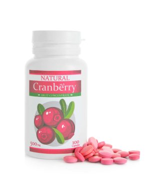 Beyaz arka planda bir şişe kızılcık hapı.