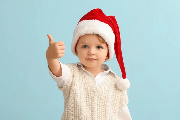 Little Boy Santa Hat Showing Thumb Color Background — Stock Photo, Image