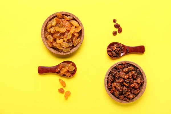 Bowls Spoons Tasty Raisins Yellow Background — Stock Photo, Image