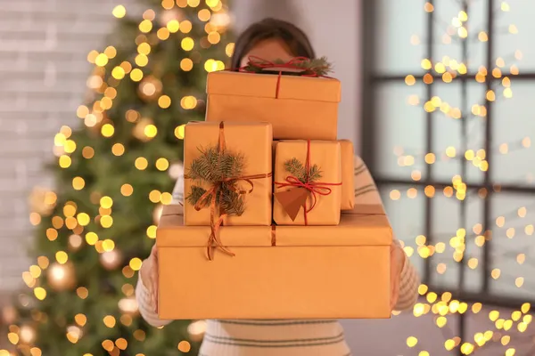 Woman Holding Gift Boxes Home Christmas Eve — Stock Photo, Image