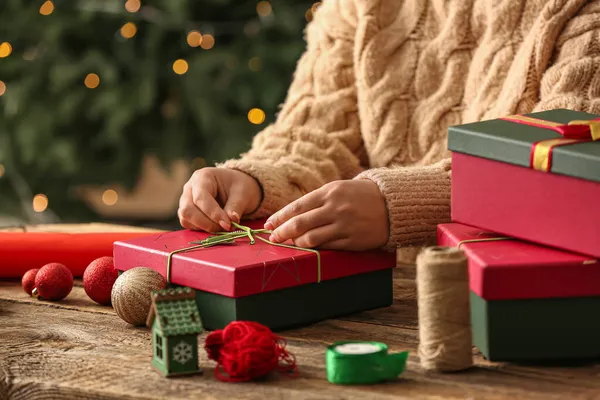 Woman Decorating Christmas Gift Box Table Indoors Closeup — Stock Photo, Image