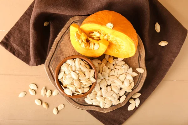 Bowl Natural Pumpkin Seeds Cut Fresh Vegetable Beige Wooden Background — Stock Photo, Image