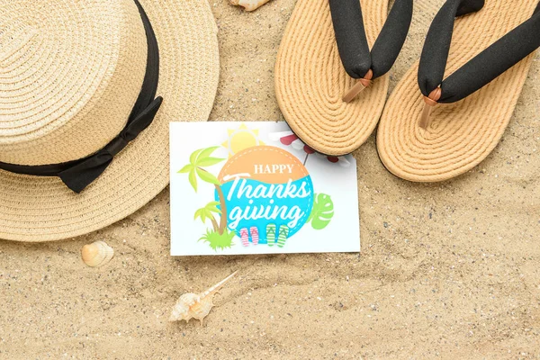 Beach Hat Flip Flops Card Text Happy Thanksgiving Sand Background — Stock Photo, Image