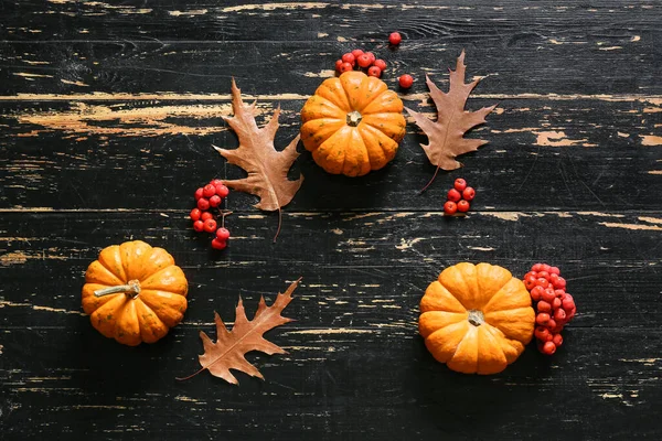 Ripe Pumpkins Rowan Berries Autumn Leaves Dark Wooden Background — Stock Photo, Image