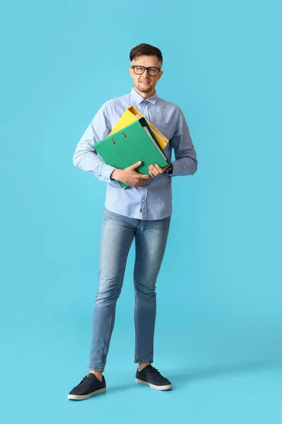Man Folders Color Background — Stock Photo, Image