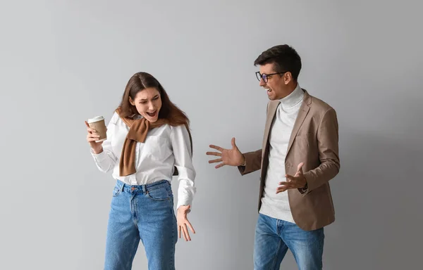 Young Couple Arguing Light Background — Stock Photo, Image