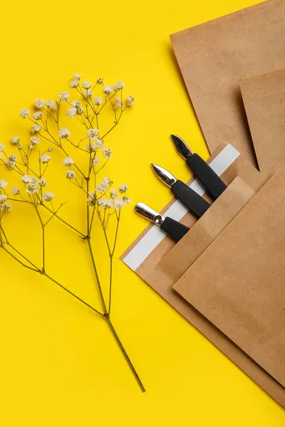 Paper Bag Manicure Equipment Flowers Yellow Background — Stock Photo, Image