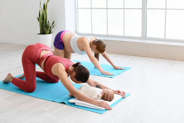 Young Pregnant Woman Doing Yoga Trainer Little Baby Gym — Stock Photo, Image