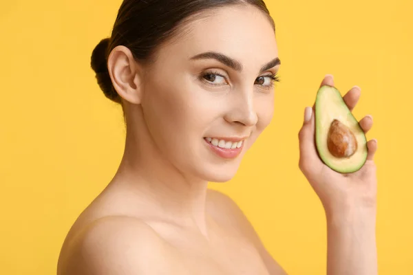 Beautiful Young Woman Healthy Skin Holding Fresh Avocado Color Background — Stock Photo, Image