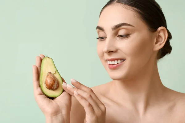 Beautiful Woman Healthy Skin Holding Fresh Avocado Color Background — Stock Photo, Image