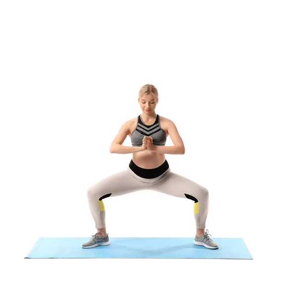 Sportliche Junge Schwangere Frau Praktiziert Yoga Auf Weißem Hintergrund — Stockfoto