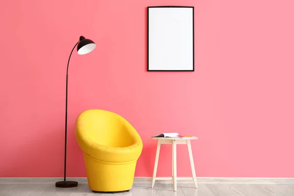 Yellow Armchair Lamp Table Blank Frame Hanging Pink Wall — Stock Photo, Image