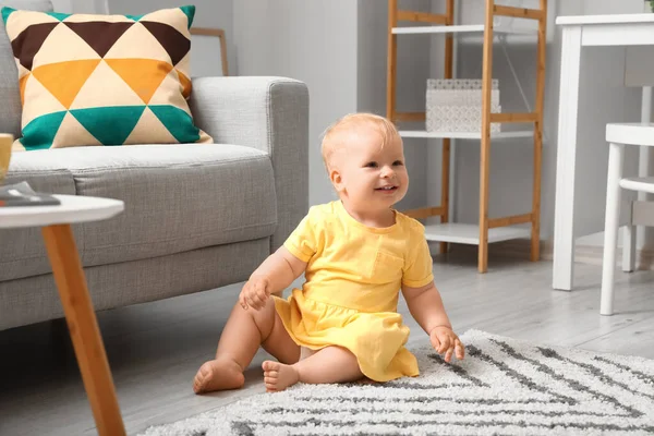 Cute Baby Girl Yellow Dress Sitting Floor Home — Stock Photo, Image