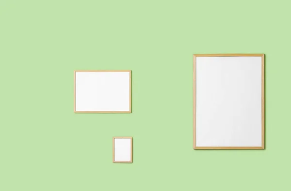 Blank Frames Hanging Green Wall — Stock Photo, Image