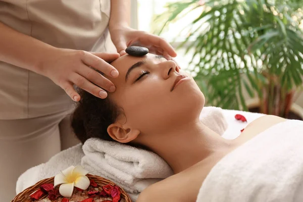 Young African American Woman Getting Facial Massage Stone Therapist Spa — Stock Photo, Image