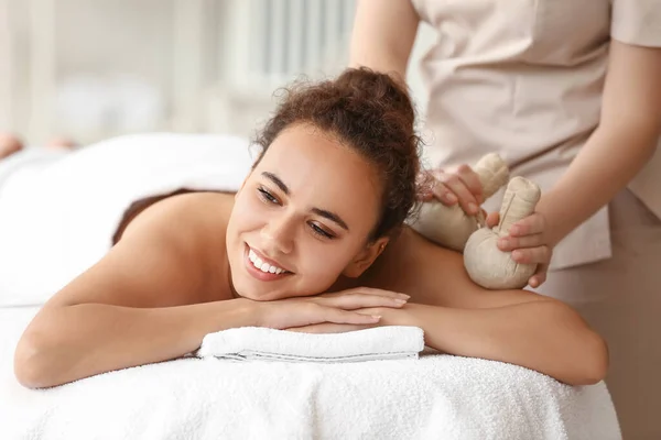 Beautiful African American Woman Getting Massage Therapist Herbal Bags Spa — Stock Photo, Image