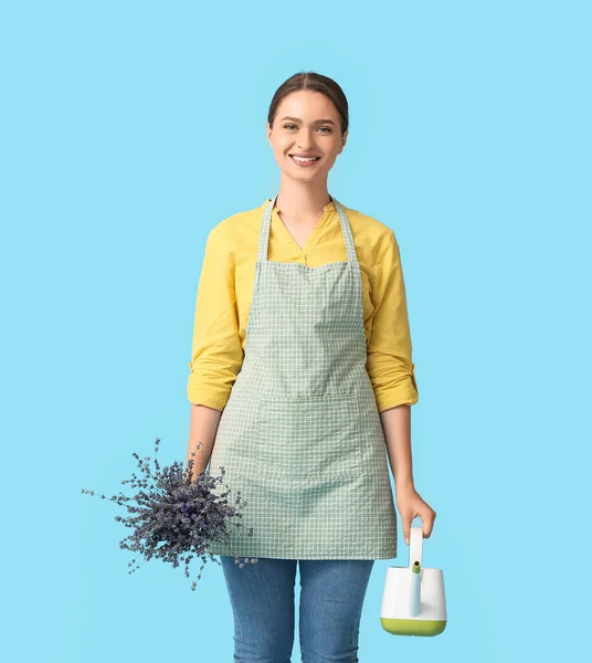 Female Gardener Lavender Watering Can Color Background — Stock Photo, Image
