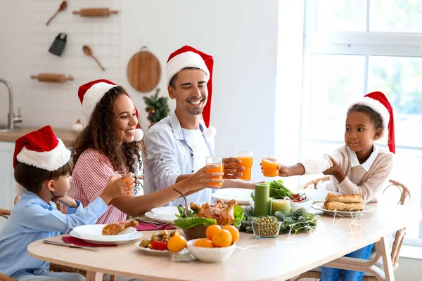 Happy Family Drinking Juice Kitchen Christmas Eve — Stock Photo, Image