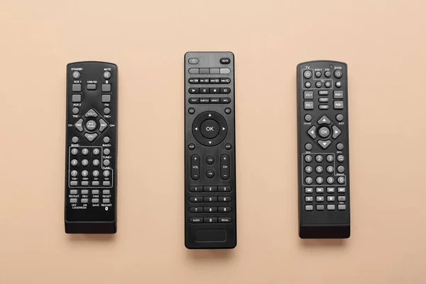 Different Modern Remote Controllers Color Background — Stock Photo, Image