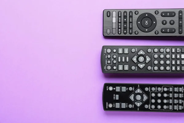 Different Remote Controllers Color Background — Stock Photo, Image