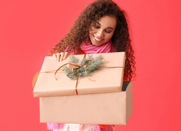 Young African American Woman Opening Big Christmas Gift Box Red — Stock Photo, Image