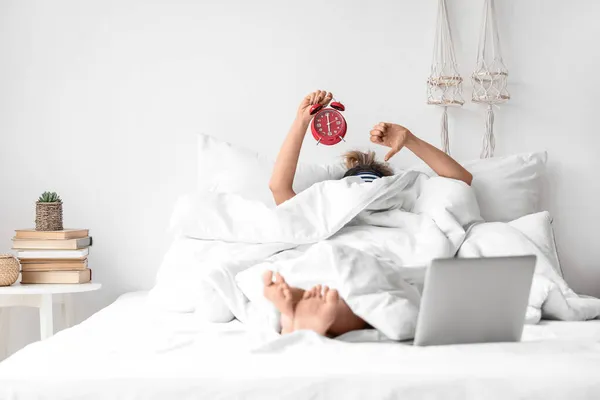 Morning Young Woman Alarm Clock Laptop Lying Bed — Stock Photo, Image