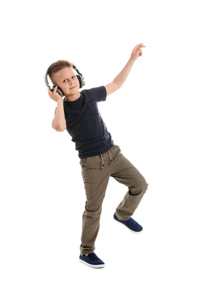 Χαριτωμένο Αγοράκι Που Ακούει Μουσική Και Χορεύει Λευκό Φόντο — Φωτογραφία Αρχείου