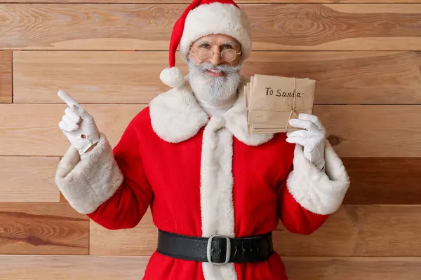 Santa Claus Letters Showing Something Wooden Background — Stock Photo, Image