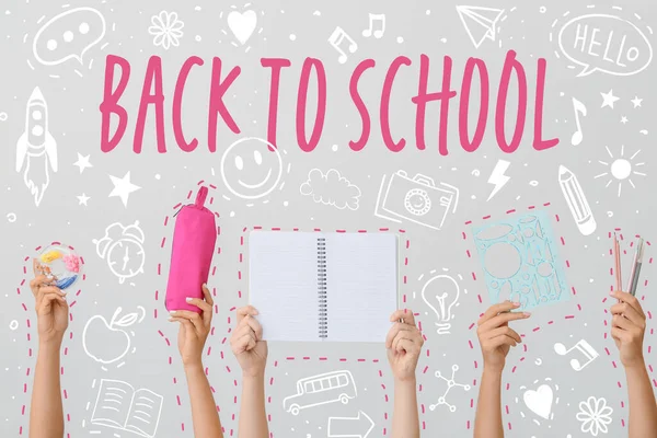 Hands Pupils Stationery Text Back School Grey Background — Stock Photo, Image