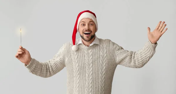 Excited Man Christmas Sparkler Grey Background — Stock Photo, Image