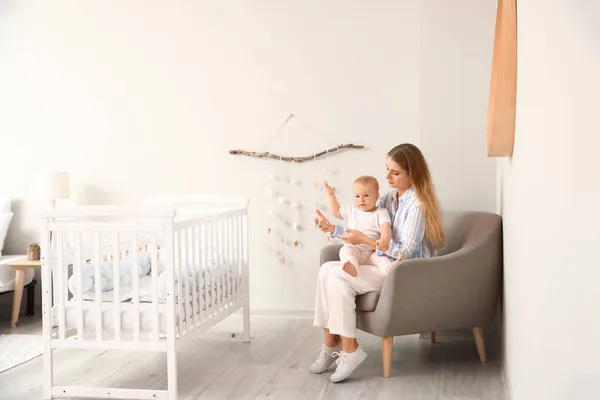 Young Mother Her Cute Little Baby Sitting Armchair Home — Stock Photo, Image