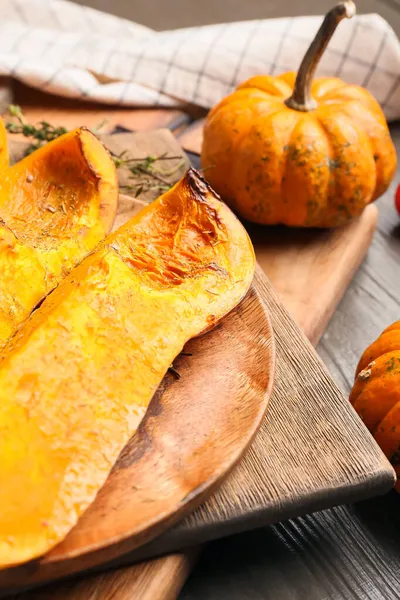 Plate Baked Pumpkin Pieces Wooden Background Closeup — Stock Photo, Image