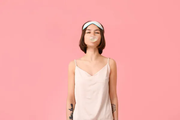 Young Woman Pajamas Chewing Gum Color Background — Stock Photo, Image