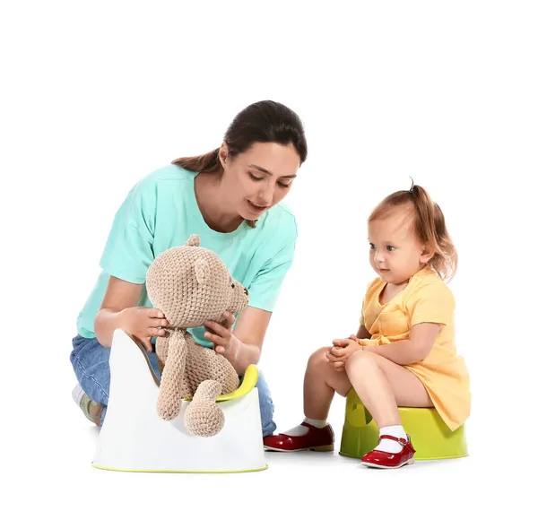 Mother Potty Training Her Little Daughter White Background — Stock Photo, Image