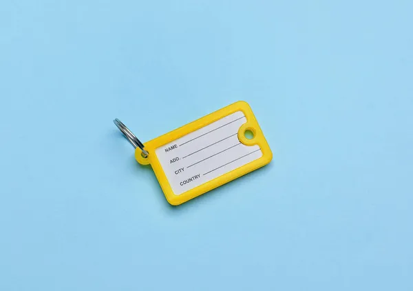 Plastic Key Tag Blue Background — Stock Photo, Image