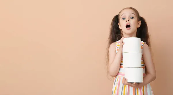 Shocked Little Girl Ponytails Holding Rolls Toilet Paper Beige Background — Stock Photo, Image