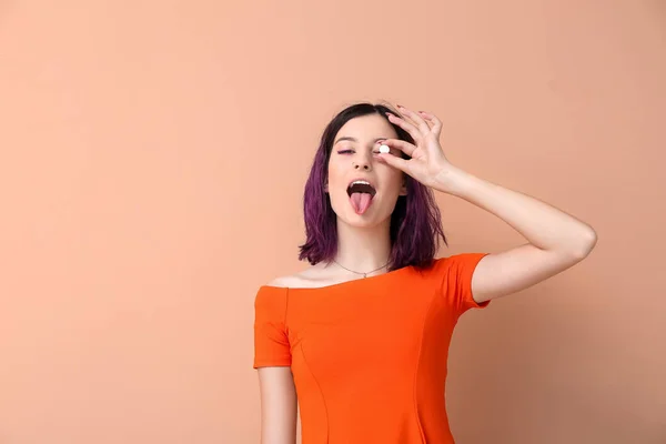 Young Woman Chewing Gum Showing Tongue Beige Background — Stock Photo, Image