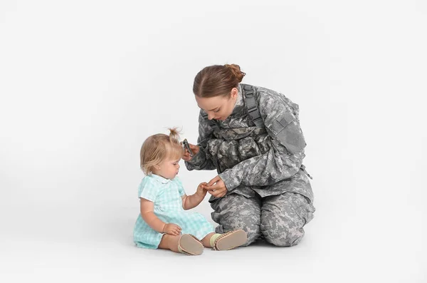 Female Soldier Her Baby Girl White Background — Stock Photo, Image